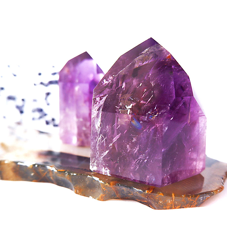Close up of ethically sourced Bahia amethyst point with rainbow by Tsukiyo Co Singapore