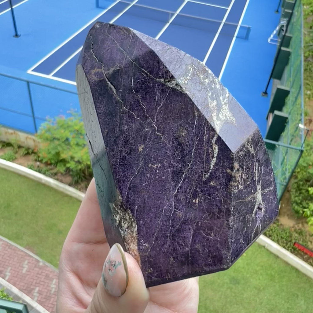 Ethically sourced polished purpurite freeform point