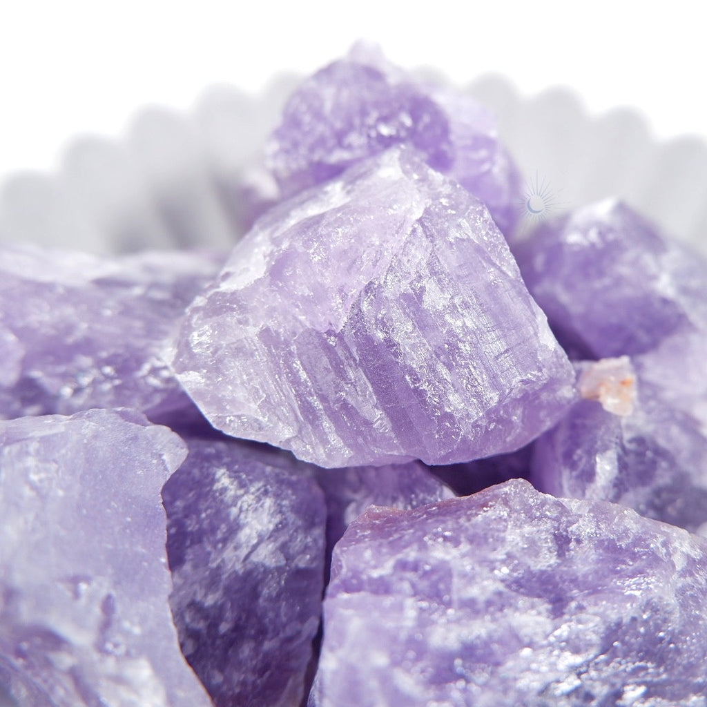 Close up of clear and purple raw amethyst from Brazil