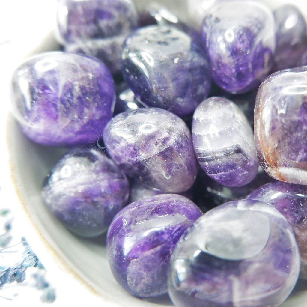 close up of ethically sourced dream amethyst tumbles from brazil by tsukiyo singapore