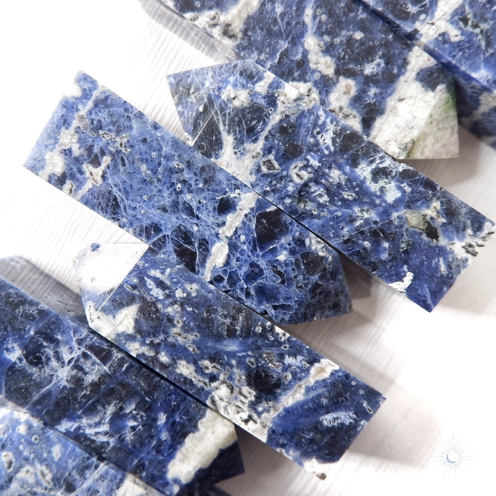 Full view of ethically sourced sodalite obelisk for focus