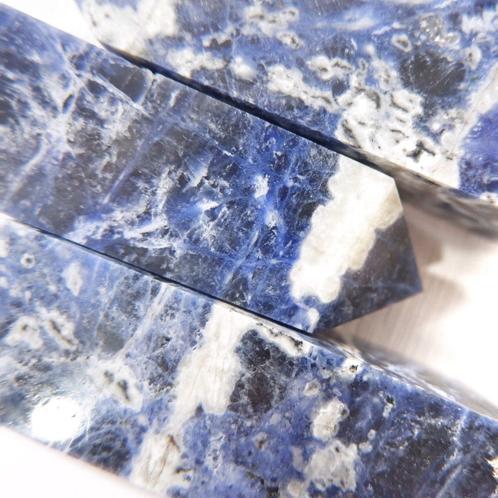 Close up of ethically sourced sodalite obelisk for focus and tranquility