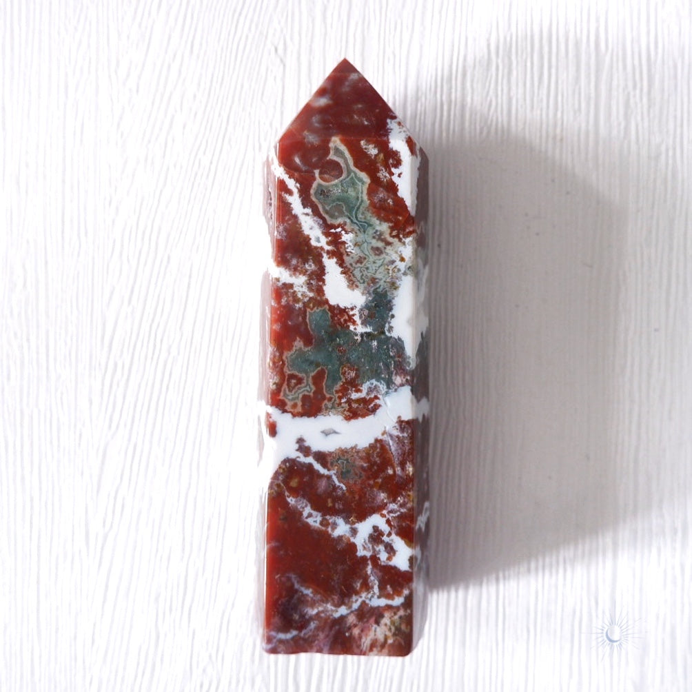 Back view of Scenic pink, maroon and green ocean jasper obelisk with druzy and white banding