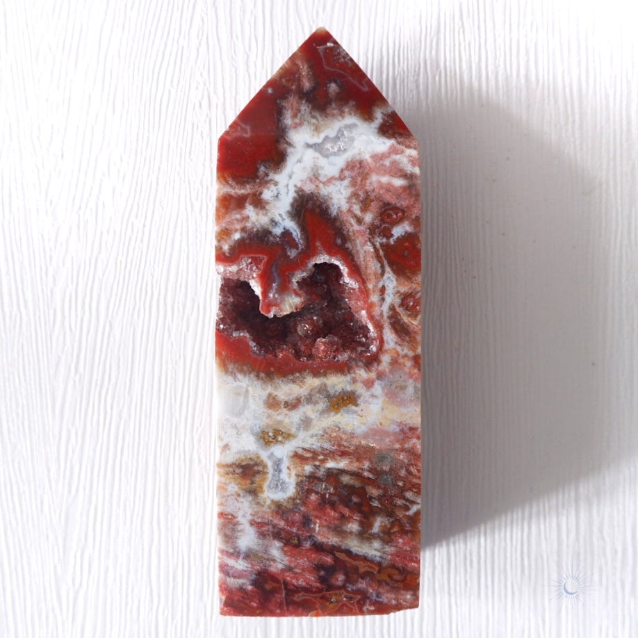 Front view of ethically sourced red druzy with pink, white and maroon ocean jasper obelisk by Tsukiyo Co