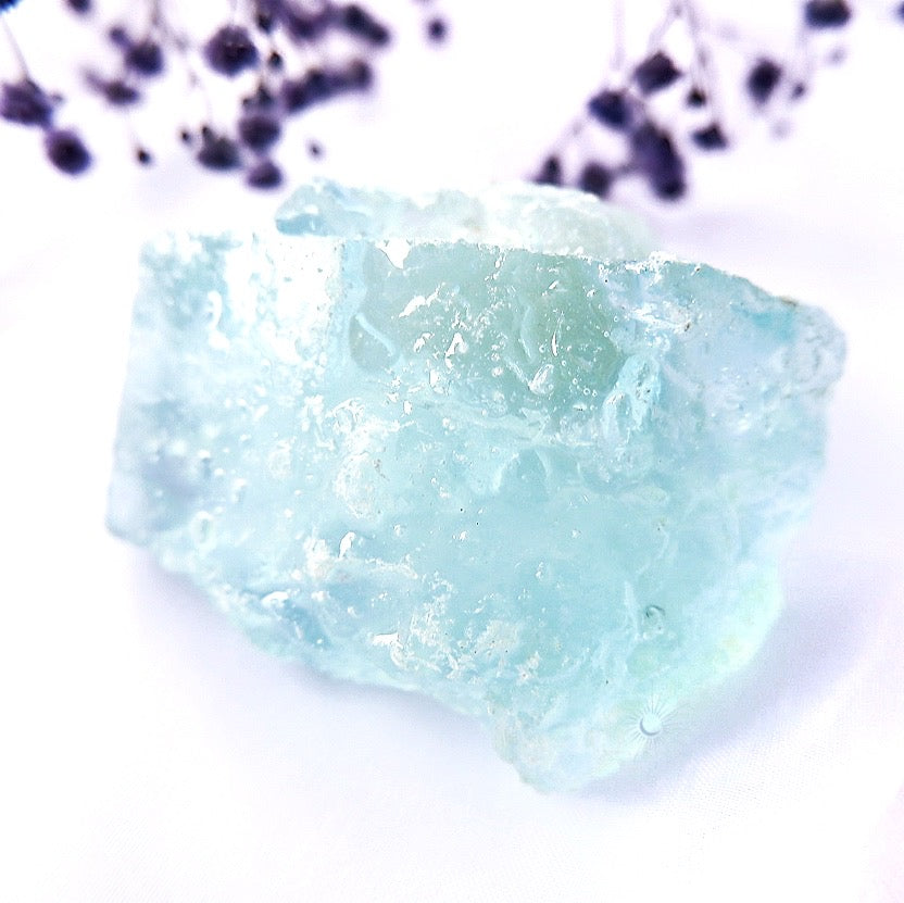 View of raw aquamarine ethically sourced by Tsukiyo Co for Peace and Serenity