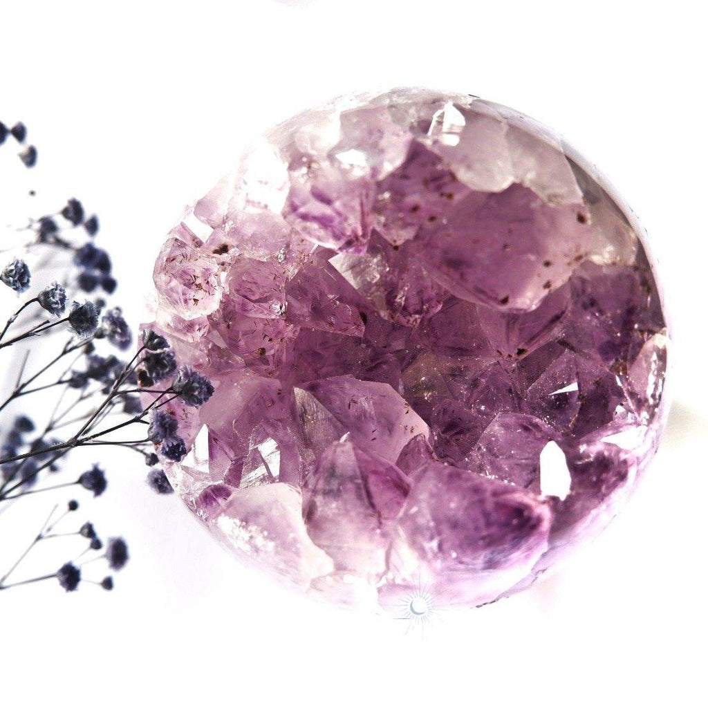Front view of druzy amethyst sphere from Brazil, with record keepers, for mindful living