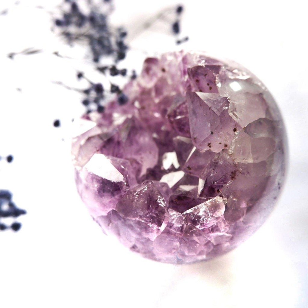 Closeup of druzy amethyst sphere from Brazil, with record keepers, for mindful living by Tsukiyo Singapore