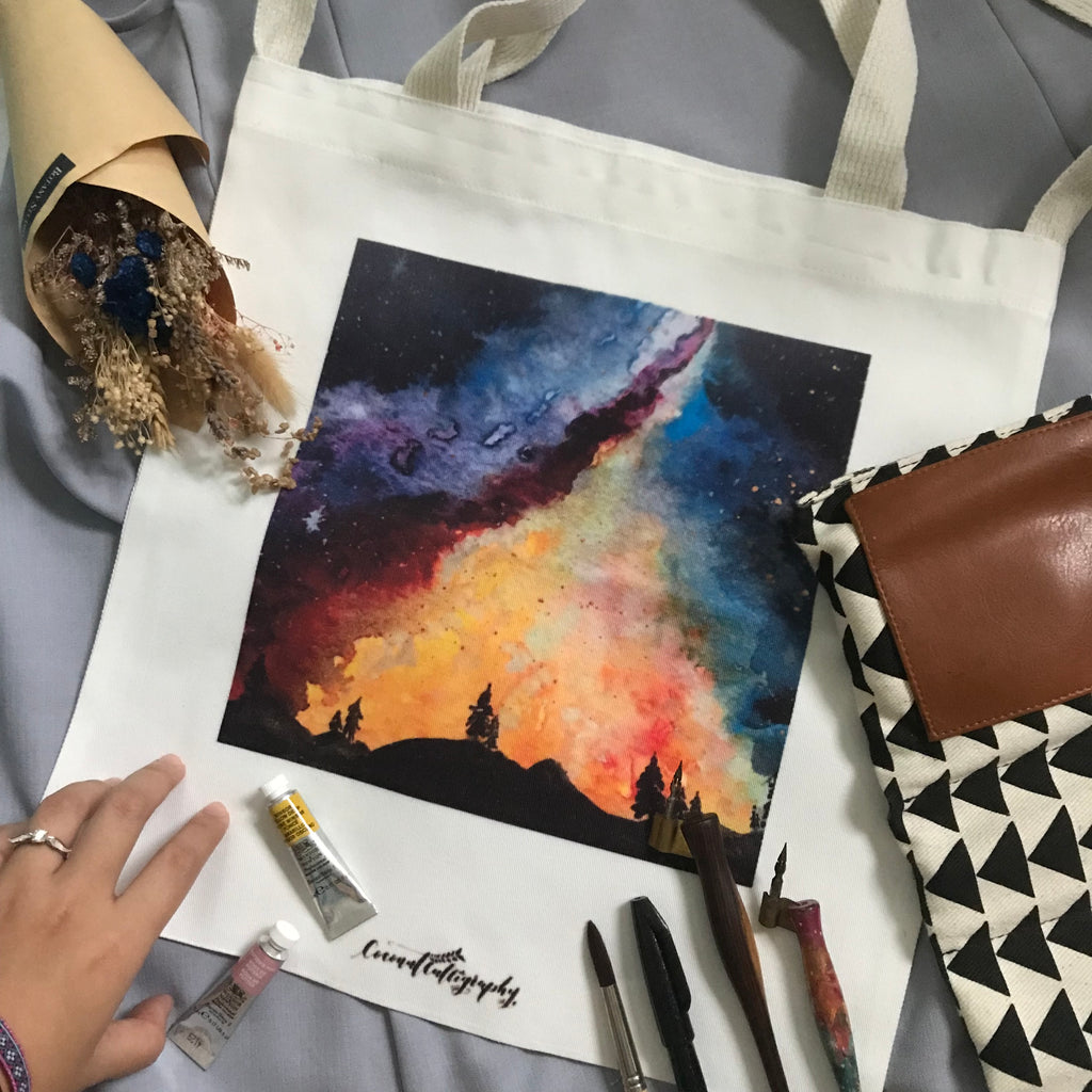 Vibrant galaxy print bag by CoconutCalligraphy